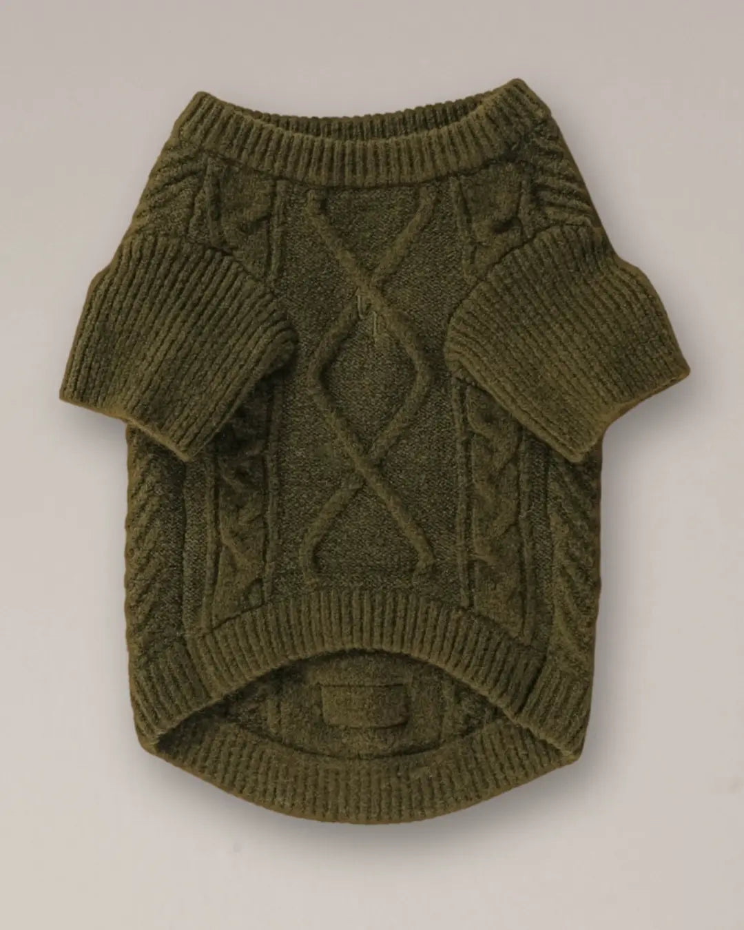 Green knitted dog jumper on a white background