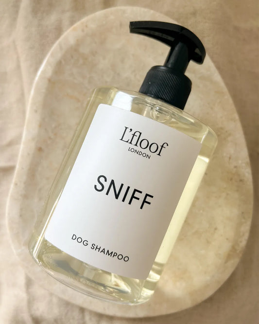 L'floof London 'Sniff' dog shampoo bottle on a beige background