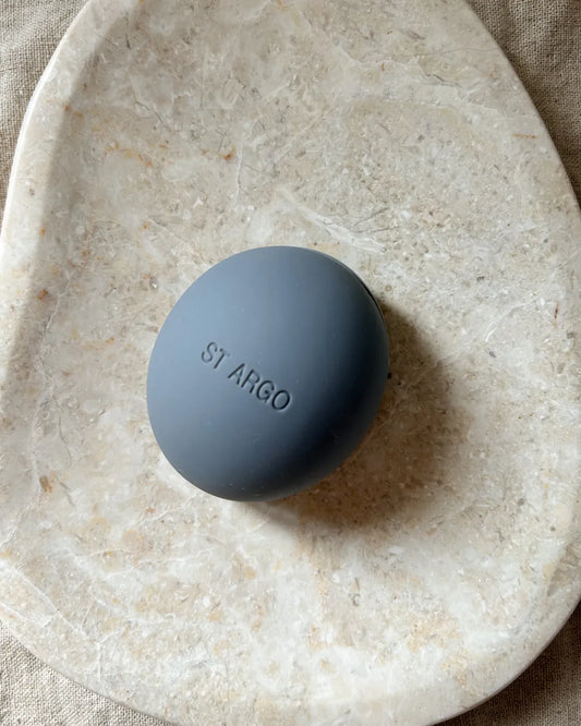 Luxury silicone dog treat pouch in grey on a beige background